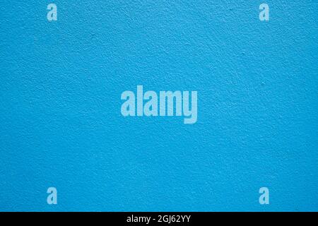 Fond de texture de mur en béton bleu, mur en ciment peint en plâtre bleu. (Pour les utilisations abstraites en arrière-plan). (édition brillante) Banque D'Images