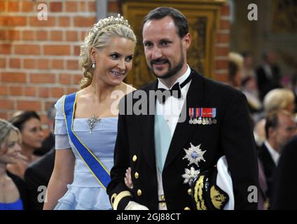 STOCKHOLM 2010-06-19 le prince héritier Haakon et la princesse Mette Marit de Norvège au mariage de la princesse Victoria et de M. Daniel Westling à la cathédrale de Stockholm, en Suède, le 19 juin 2010. Foto: Pontus Lundahl / SCANPIX SUÈDE / Kod 10050 Banque D'Images