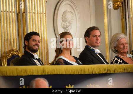 STOCKHOLM 2013-12-20 le prince suédois Carl Philip, la princesse Madeleine et M. Christopher O'Neill lors du rassemblement officiel de l'Académie suédoise tenu à la Bourse de Stockholm le 20 décembre 2013. Photo: Jonas Ekstromer / TT / code 10030 Banque D'Images