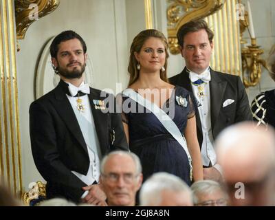 STOCKHOLM 2013-12-20 le prince suédois Carl Philip, la princesse Madeleine et M. Christopher O'Neill lors du rassemblement officiel de l'Académie suédoise tenu à la Bourse de Stockholm le 20 décembre 2013. Photo: Jonas Ekstromer / TT / code 10030 Banque D'Images