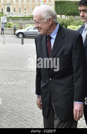 STOCKHOLM 20140617 l'ancien président américain Jimmy carter quitte le ministère des Affaires étrangères à Stockholm, Suède, le 17 juin 2014. Le Président carter s'est rendu au Ministère pour des entretiens sur des questions de droit sur la démocratie, les droits de l'homme et la situation en Afrique. . Foto: Henrik Montgomery / TT / Kod: 10060 Banque D'Images