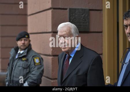 STOCKHOLM 20140617 l'ancien président américain Jimmy carter quitte le ministère des Affaires étrangères à Stockholm, Suède, le 17 juin 2014. Le Président carter s'est rendu au Ministère pour des entretiens sur des questions de droit sur la démocratie, les droits de l'homme et la situation en Afrique. . Foto: Henrik Montgomery / TT / Kod: 10060 Banque D'Images