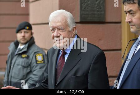 STOCKHOLM 20140617 l'ancien président américain Jimmy carter quitte le ministère des Affaires étrangères à Stockholm, Suède, le 17 juin 2014. Le Président carter s'est rendu au Ministère pour des entretiens sur des questions de droit sur la démocratie, les droits de l'homme et la situation en Afrique. . Foto: Henrik Montgomery / TT / Kod: 10060 Banque D'Images