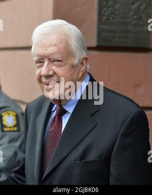 STOCKHOLM 20140617 l'ancien président américain Jimmy carter quitte le ministère des Affaires étrangères à Stockholm, Suède, le 17 juin 2014. Le Président carter s'est rendu au Ministère pour des entretiens sur des questions de droit sur la démocratie, les droits de l'homme et la situation en Afrique. . Foto: Henrik Montgomery / TT / Kod: 10060 Banque D'Images