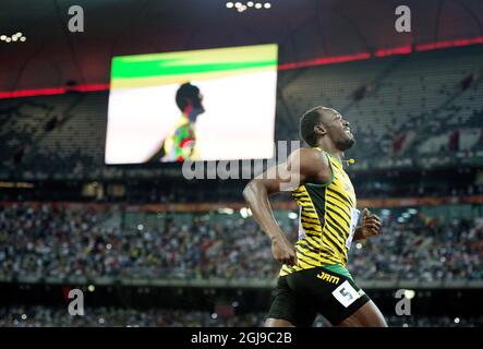 BEIJING 20150823 Usain Bolt de la Jamaïque après avoir remporté la finale masculine de 100m lors des Championnats du monde de l'IAAF de Beijing 2015 au Stade national de Beijing, Chine, le 23 août 2015. Photo: Jessica Gow / TT / Kod 10070 Banque D'Images