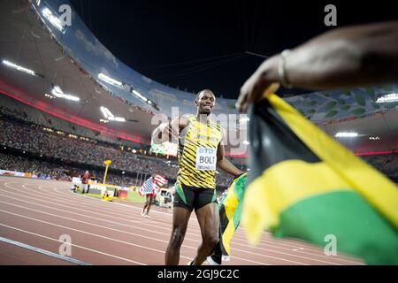 BEIJING 20150823 Usain Bolt de la Jamaïque après avoir remporté la finale masculine de 100m lors des Championnats du monde de l'IAAF de Beijing 2015 au Stade national de Beijing, Chine, le 23 août 2015. Photo: Jessica Gow / TT / Kod 10070 Banque D'Images