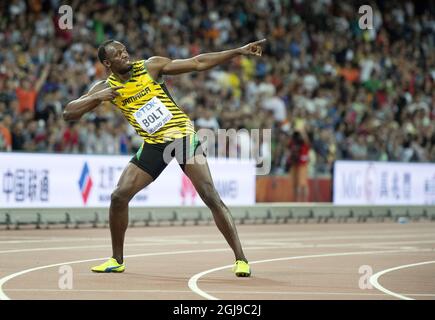 BEIJING 20150823 Usain Bolt de la Jamaïque après avoir remporté la finale masculine de 100m lors des Championnats du monde de l'IAAF de Beijing 2015 au Stade national de Beijing, Chine, le 23 août 2015. Photo: Jessica Gow / TT / Kod 10070 Banque D'Images