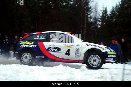 Colin McRae dans son Ford Focus Banque D'Images