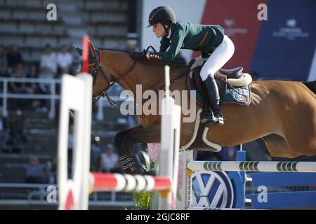 STOCKHOLM 20190614 Jessica Springsteen fait le cheval RMF Swinny du Parc lors de la compétition de saut en équipe Ligue mondiale des Champions à Stockholms stadion, Stockholm, Suède le 14 juin 2019. Foto: Fredrik Persson / TT / Kod 1081 Banque D'Images