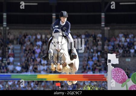 Jennifer Gates, des États-Unis, fait du cheval Pumped Up lors de la deuxième partie de l'événement de saut d'équipe de la Ligue des champions de Suède au stade olympique de Stockholm, le 15 juin 2019. Photo: Jessica Gow / TT / code 10070 Banque D'Images