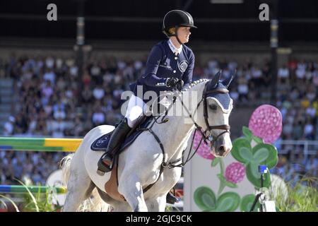 Jennifer Gates, des États-Unis, fait du cheval Pumped Up lors de la deuxième partie de l'événement de saut d'équipe de la Ligue des champions de Suède au stade olympique de Stockholm, le 15 juin 2019. Photo: Jessica Gow / TT / code 10070 Banque D'Images