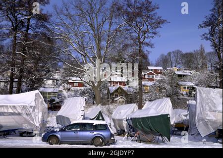 Allotements et stockage de bateaux à Sodermalm à Stockholm, en Suède, après une forte chute de neige. Photo: Janerik Henriksson / TT / code 10010 Banque D'Images