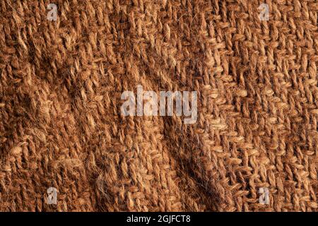 Gros plan de texture tricoté à la main laine brun fond d'écran Banque D'Images