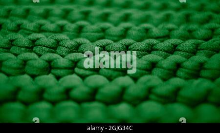 Fond vert vif grand motif en maille. Banque D'Images
