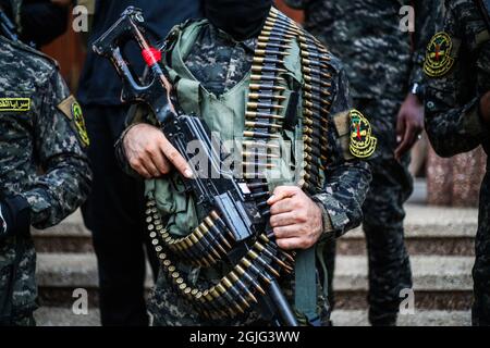 Gaza, Palestine. 09e septembre 2021. Un combattant palestinien de Saraya Al-Quds se présente à une marche militaire pour célébrer l'évasion des six prisonniers palestiniens de la prison israélienne de 'Gilboa' il y a deux jours dans le camp de réfugiés de Dair Al-Balah, dans la bande centrale de Gaza. Crédit : SOPA Images Limited/Alamy Live News Banque D'Images