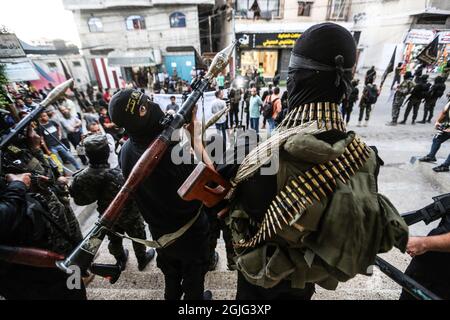 Gaza, Palestine. 09e septembre 2021. Les combattants palestiniens de Saraya Al-Quds se tiennent à une marche militaire pour célébrer l'évasion des six prisonniers palestiniens de la prison israélienne de 'Gilboa' il y a deux jours dans le camp de réfugiés de Dair Al-Balah, dans la bande centrale de Gaza. Crédit : SOPA Images Limited/Alamy Live News Banque D'Images