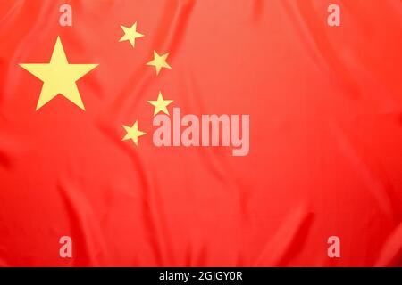 Le drapeau national de la République populaire de Chine comme toile de fond Banque D'Images