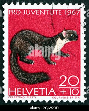 SUISSE - VERS 1967: Un timbre imprimé en Suisse montre Pine Marten, Martes Martes, Animal, vers 1967 Banque D'Images