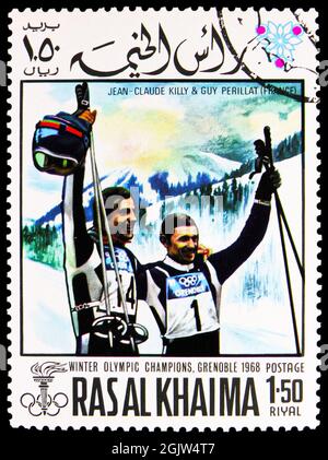 MOSCOU, RUSSIE - 20 JUIN 2021 : timbre-poste imprimé à Ras Al Khaimah montre Jean Claude Killy (1943) et Guy Perillat (1940), France, Jeux olympiques d'hiver Banque D'Images