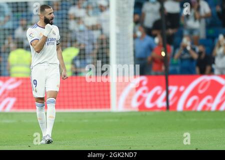 Madrid, Espagne. 12 septembre 2021. Karim Benzema du Real Madrid célèbre lors d'un match de football de la ligue espagnole entre Real Madrid et RC Celta à Madrid, Espagne, le 12 septembre 2021. Crédit: Edward F. Peters/Xinhua/Alay Live News Banque D'Images