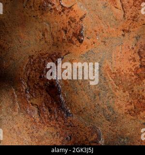 Gros plan rustique abstrait de carreaux de pierre brun terreux africains naturels Banque D'Images