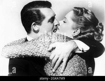 CARY GRANT comme compositeur Cole porter et ALEXIS SMITH publicité pose pour la biographie fictive NUIT ET JOUR 1946 réalisateur MICHAEL CURTIZ Warner Bros. Banque D'Images