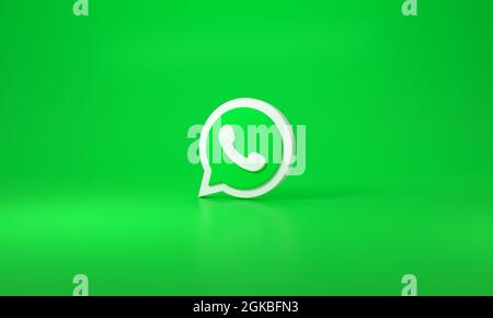 Logo WhatsApp sur fond vert. Rendu 3D. Banque D'Images