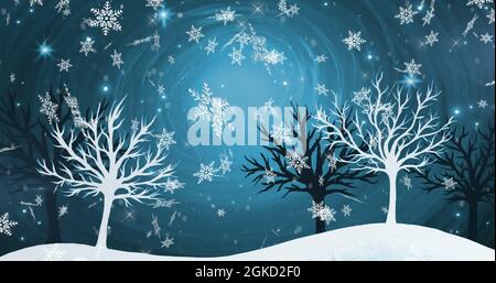 Image de neige tombant sur des arbres sur un fond bleu éclatant Banque D'Images