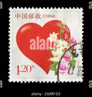 Le timbre imprimé en Chine montre l'image de l'Amour. Banque D'Images