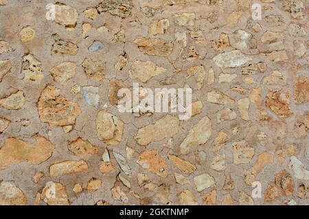 Détails de la texture de pierre de sable, gros plan de la surface de roche, idée pour l'arrière-plan ou la toile de fond Banque D'Images