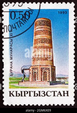 KIRGHIZISTAN - VERS 1993 : un timbre imprimé au Kirghizistan montre la Tour de Burana, Monument architectural du XIe siècle, vers 1993 Banque D'Images