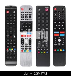 Jeu de 4 télécommandes différentes pour différents modèles de téléviseurs, isolées sur fond blanc Banque D'Images