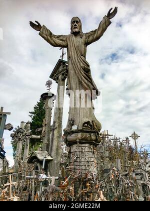 The Hill of Crosses - a site of pilgrimage in northern Lithuania. Over the generations, crosses, crucifixes, statues of the Virgin Mary and thousands Stock Photo