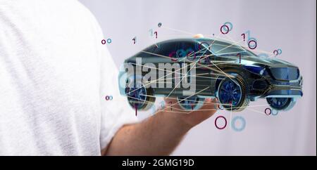Mains mâles avec rendu 3d de la conduite autonome avec une voiture électrique Banque D'Images