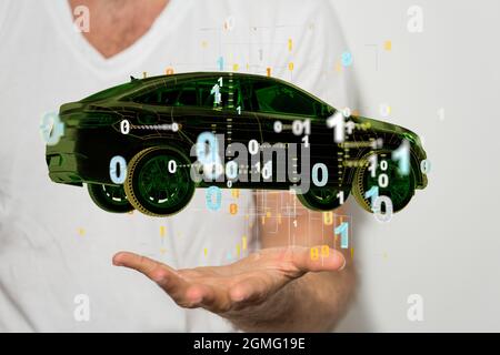 Mains mâles avec rendu 3d de la conduite autonome avec une voiture électrique Banque D'Images
