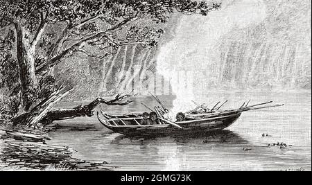 Mission scientifique française au Cap Horn, 1882-1883. Canoë des habitants de Tierra del Fuego, Chili. Amérique du Sud. Ancienne illustration gravée du XIXe siècle de la nature 1883 Banque D'Images