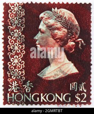 MOSCOU, RUSSIE - 6 NOVEMBRE 2019 : timbre-poste imprimé à Hong Kong montre la reine Elisabeth II, série 1962-1972, vers 1976