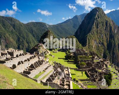 Machu Picchu, Pérou - 14 mai 2018 situé dans un endroit montagneux impressionnant à 2400m d'altitude dans les Andes, les ruines de la ville inca du XVe siècle Banque D'Images