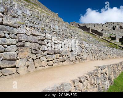 Machu Picchu, Pérou - 14 mai 2018 situé dans un endroit montagneux impressionnant à 2400m d'altitude dans les Andes, les ruines de la ville inca du XVe siècle Banque D'Images