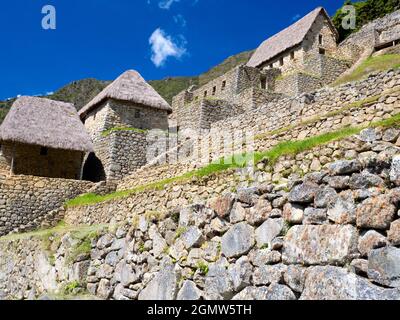 Machu Picchu, Pérou - 14 mai 2018 situé dans un endroit montagneux impressionnant à 2400m d'altitude dans les Andes, les ruines de la ville inca du XVe siècle Banque D'Images