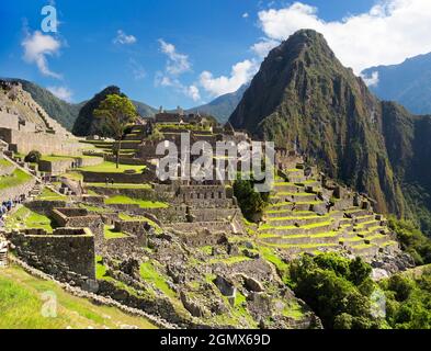 Machu Picchu, Pérou - 14 mai 2018 situé dans un endroit montagneux impressionnant à 2400m d'altitude dans les Andes, les ruines de la ville inca du XVe siècle Banque D'Images