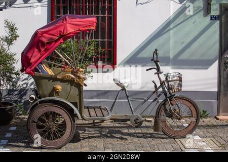 Un pousse-pousse dans le district de Gusu, Suzhou City, Jiangsu. Banque D'Images