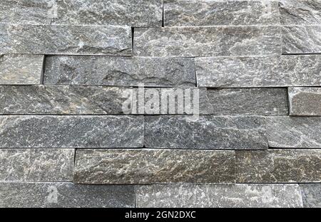 Arrière-plan de mur en marbre. Mur de briques en marbre comme texture et arrière-plan. Banque D'Images