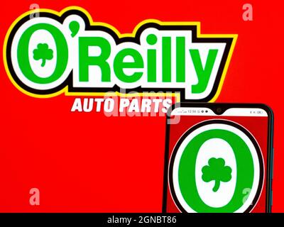 Dans cette illustration, le logo O’Reilly Automotive, Inc. Est affiché sur un smartphone et en arrière-plan. (Photo par Igor Golovniov / SOPA Images/Sipa USA) Banque D'Images