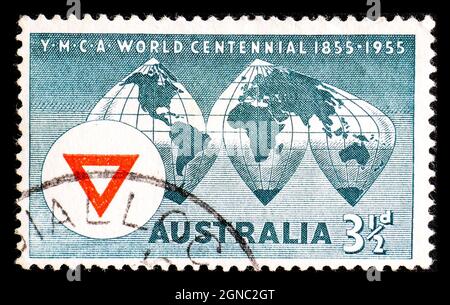 AUSTRALIE - VERS 1955: Un timbre imprimé en Australie, montre la carte du monde, Emblem YMCA Banque D'Images