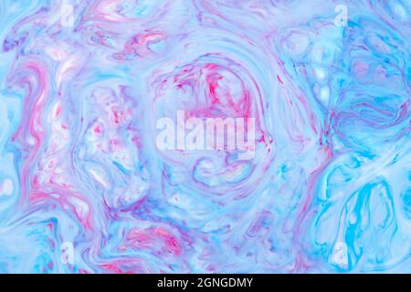 Fluide Art. Abstrait peinture liquide fond texturé avec spirales et tourbillons décoratifs. Fond bleu rose liquide. Papier peint tendance Banque D'Images