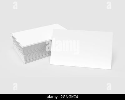 Pile de cartes de visite blanche avec une carte de visite frontale, isolée sur un fond blanc, illustration en rendu 3d Banque D'Images