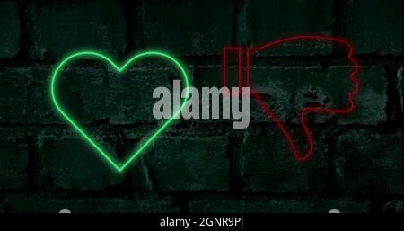Image de coeur vert néon et de pouces rouges vers le haut et vers le bas et des signes de nuage clignotant sur le fond de brique Banque D'Images