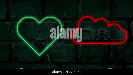 Image de coeur vert néon et de pouces rouges vers le haut et vers le bas et des signes de nuage clignotant sur le fond de brique Banque D'Images