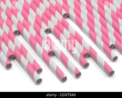 pailles à boire en papier à rayures roses isolées sur fond blanc Banque D'Images